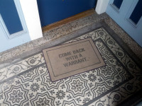Come Back With a Warrant doormat, Cindy's place, Noe Valley, San Francisco, CA by Cory Doctorow (CC BY-SA 2.0) https://flic.kr/p/bB3VJN