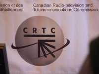 The CRTC listened intently to the CFRO presentation by Robin Puga (CC BY-NC-SA 2.0) https://flic.kr/p/8XhHm1