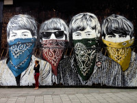 Girl in Front of Beatles Mural by James Jardine (CC BY-NC-ND 2.0) https://flic.kr/p/dbQUCt