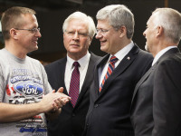 The Prime Minister and I talking with a Ford employee by Terence Young (CC BY-NC-ND 2.0) https://flic.kr/p/dNKunv