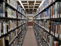 Toronto: book stacks at Toronto Reference Library by The City of Toronto (CC BY 2.0) https://flic.kr/p/gjDrZY
