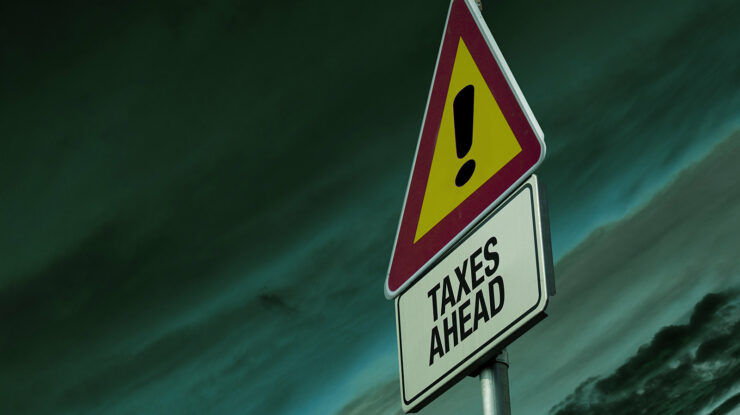 Warning sign of 'Taxes Ahead' by EFile989 http://www.efile.com/ (CC BY-SA 2.0) https://flic.kr/p/mnkQsH