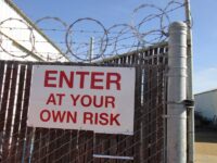 Barbed Wire Cyclone Fence Sign, Enter At Your Own Risk by Lynn Friedman (CC BY-NC-ND 2.0) https://flic.kr/p/9cY2Vt