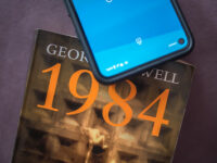 2021 "George Orwell's book "1984" and a smartphone. Modern cell phones as a means of surveillance and control." by Ivan Radic (CC BY 2.0 US). https://flic.kr/p/2kCMEbJ