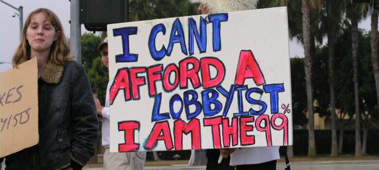 I can't Afford a Lobbyist, Occupy Irvine, CC BY 2.0 , via Wikimedia Commons