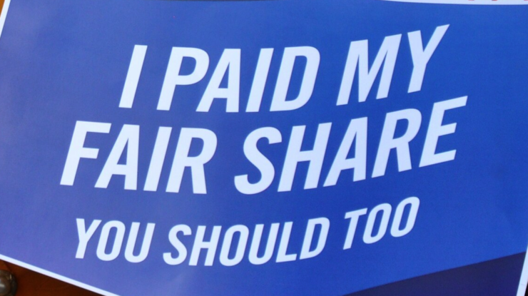 Tax Day New York. April 17, 2012 (7104232285) by Michael Fleshman from Brooklyn, The Democratic People's Republic of Brooklyn, CC BY-SA 2.0 , via Wikimedia Commons