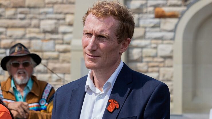 Profile_Photo_of_Marc_Miller_at_a_press_conference by Satiricalman, CC BY-SA 4.0 , via Wikimedia Commons