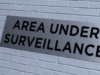 Surveillance (52286828) by Jake Basile, CC BY 3.0 , via Wikimedia Commons