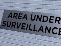 Surveillance (52286828) by Jake Basile, CC BY 3.0 , via Wikimedia Commons