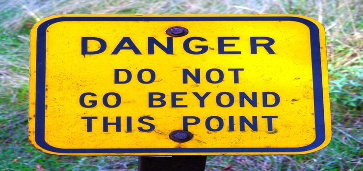 Danger Do Not Go Beyond This Point Sign by Rick Obst, CC BY 2.0 , via Wikimedia Commons
