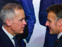 Paris, France, January 6, 2026 - Prime Minister Mark Carney shakes hands with French President Emmanuel Macron as leaders of the Coalition of the Willing gather at the Élysée Palace ahead of a family photo.
Photo: Lars Hagberg https://www.pm.gc.ca/sites/pm/files/2026-02/2026-01-06-8-LH-Paris-21-FR.jpg