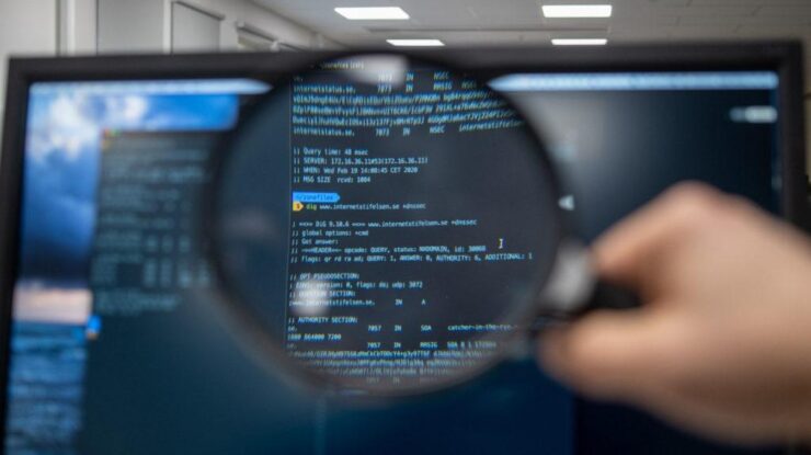 Magnifying glass over code. Photo by Kristina Alexanderson (internetstiftelsen), CC-BY-SA https://www.lawfaremedia.org/article/new-ai-transparency-rules-have-a-trade-secrets-problem