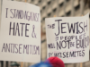 Group of people holding signs in the street by Levi Meir Clancy, Unsplash licence, https://unsplash.com/@levimeirclancy