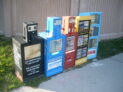 Newspaper_vending_machines_in_Canada by Katarighe., CC BY-SA 3.0 , via Wikimedia Commons