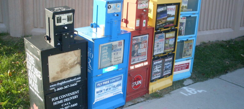 Newspaper_vending_machines_in_Canada by Katarighe., CC BY-SA 3.0 , via Wikimedia Commons